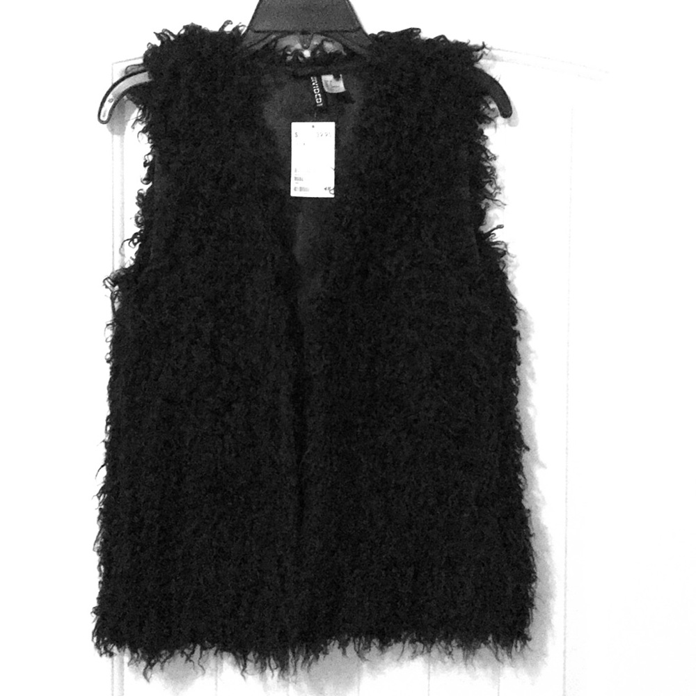 Black furry vest